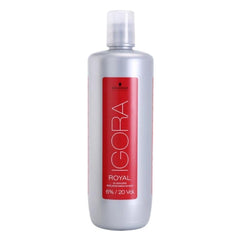 A bottle of Schwarzkopf Igora Royal hair developer, 6% / 20 Vol, in a metallic silver bottle with a red label and a clear cap, on a white background.