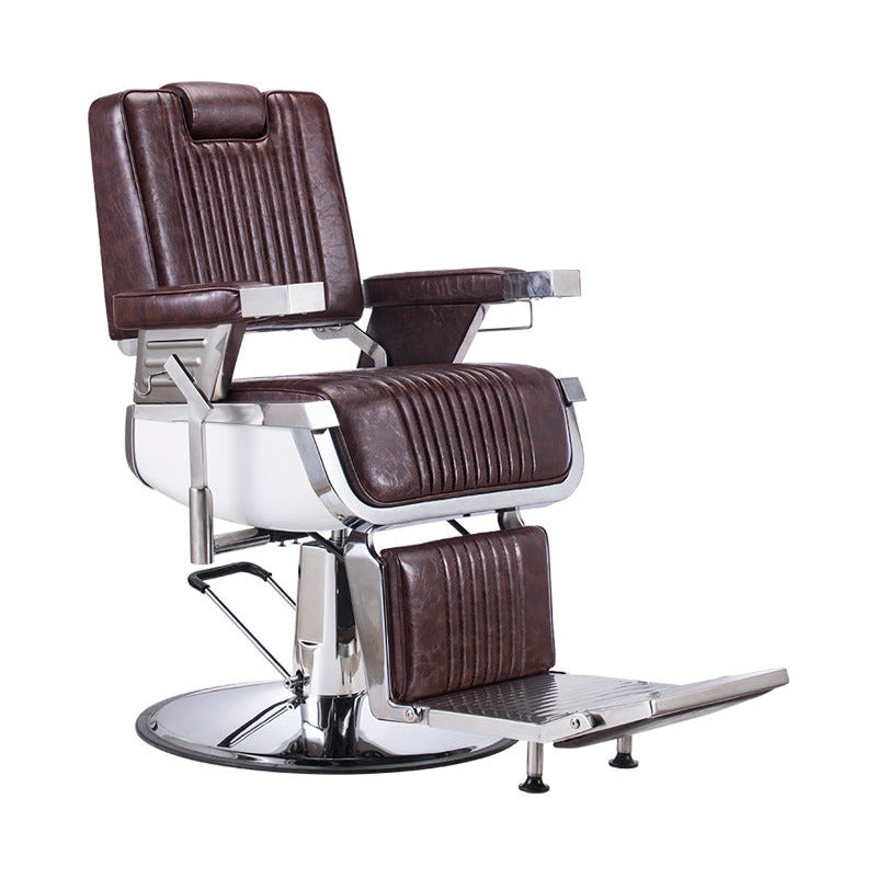 Retro barber chair in brown leather and chrome detailing